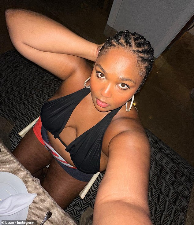 Looking good: Lizzo put on a busty display in a plunging black ʙικιɴι as she posed for a number of Instagram selfies while relaxing in the Bahamas on Sunday