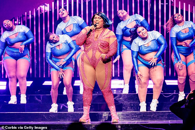 Wow! On Thursday, Lizzo, 24, exuded confidence in a sparkling pink bodysuit as she performed on stage at the Mediolanum Forum of ᴀssago in Milan, Italy