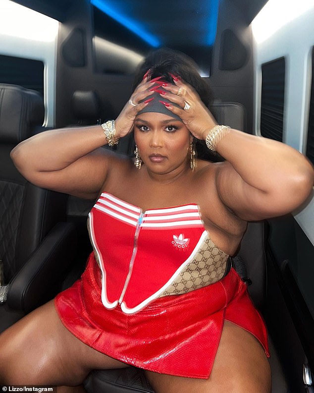 Fashionista: Lizzo (born Melissa Viviane Jefferson), 34, showed off her love of Gucci and struck a few poses in a red ensemble from the Adidas x Gucci collaboration as she shared images of the outfit she wore at Beyonce's star-studded 41st birthday bash