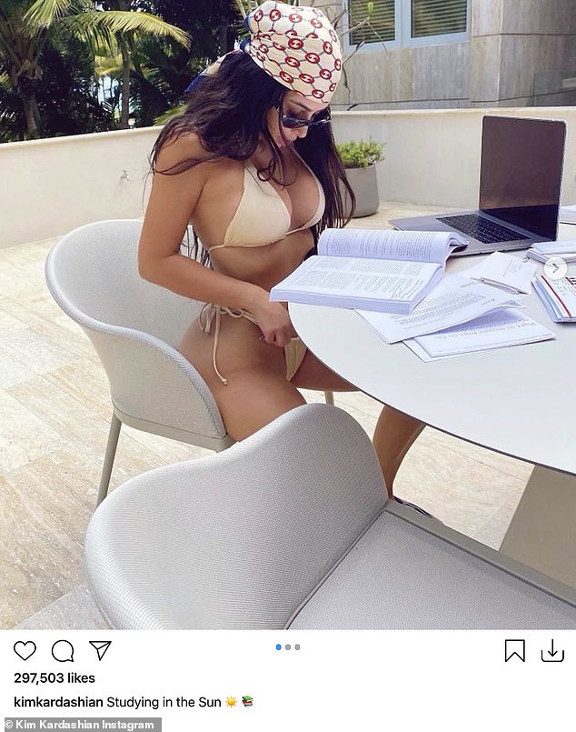 Wow! Kim Kardashian proved she is not your standard legal eagle as she took to social media on Thursday to share a trio of snaps showing her labouring over her studies - in extremely Sєxy style