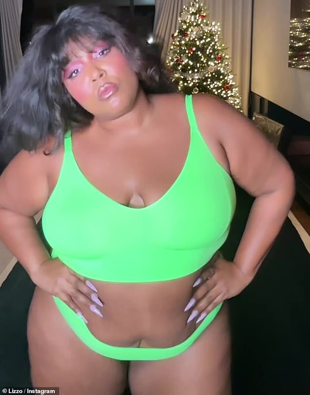 Green with envy: Lizzo modelled a selection of bottom-flashing underwear sets as she celebrated the new year with a new Instagram reel on Monday