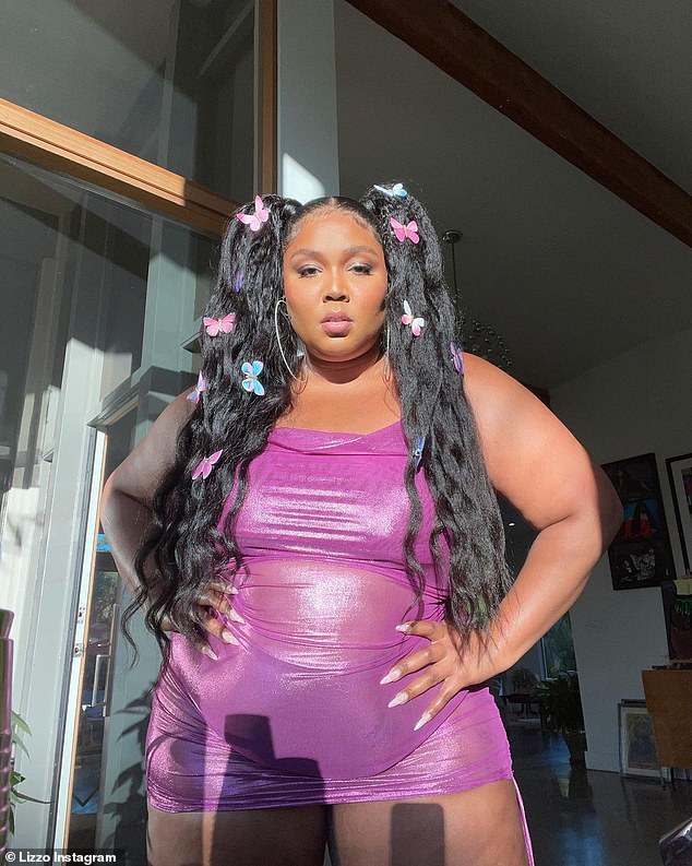 H๏τ stuff: Lizzo, 33, proudly showed off her curves in a see-through purple mini dress for her latest set of pH๏τographs, which she uploaded to Instagram on Sunday evening