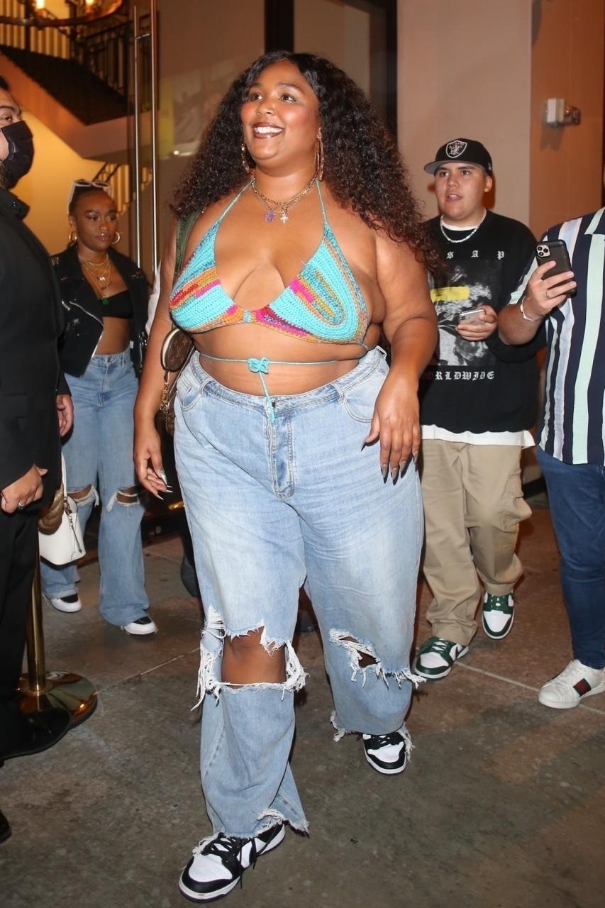 Lizzo looked incredible as she stepped out in West Hollywood yesterday in a bright blue crochet bra