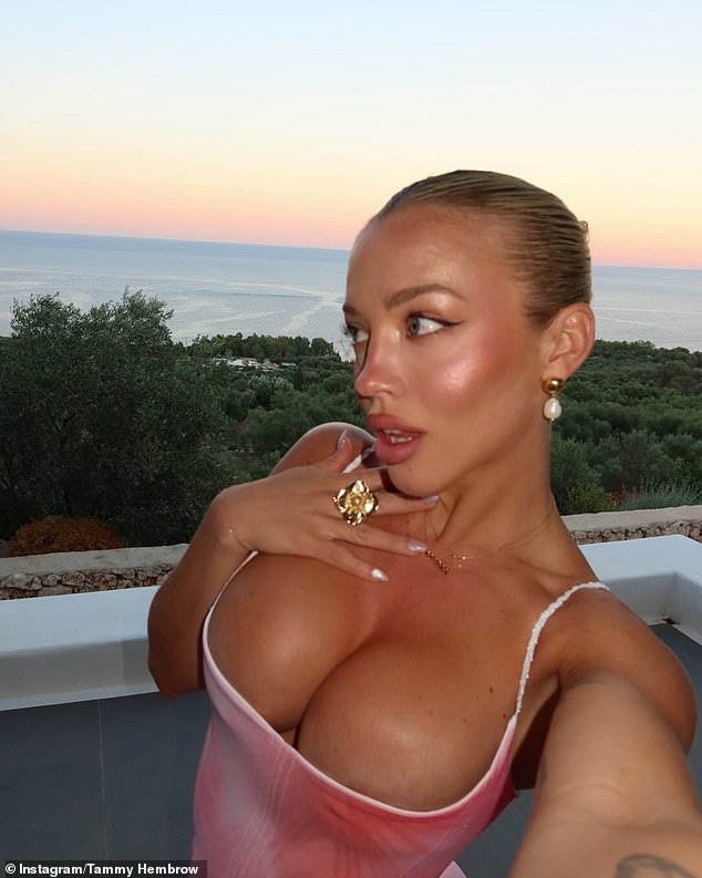 Tammy Hembrow (pictured) was roasted by her fans after risking a major wardrobe malfunction while on vacation in Greece