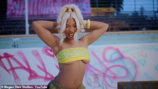 Megan Thee Stallion, 29, set pulses racing in a tiny yellow bralette as she dropped her very raunchy music video for Roc Steady on Thursday