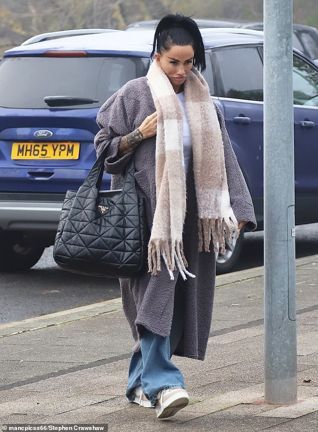 Katie Price wrapped up warm against the cold weather as she attended rehearsals for her new pantomime in Northwich on Thursday