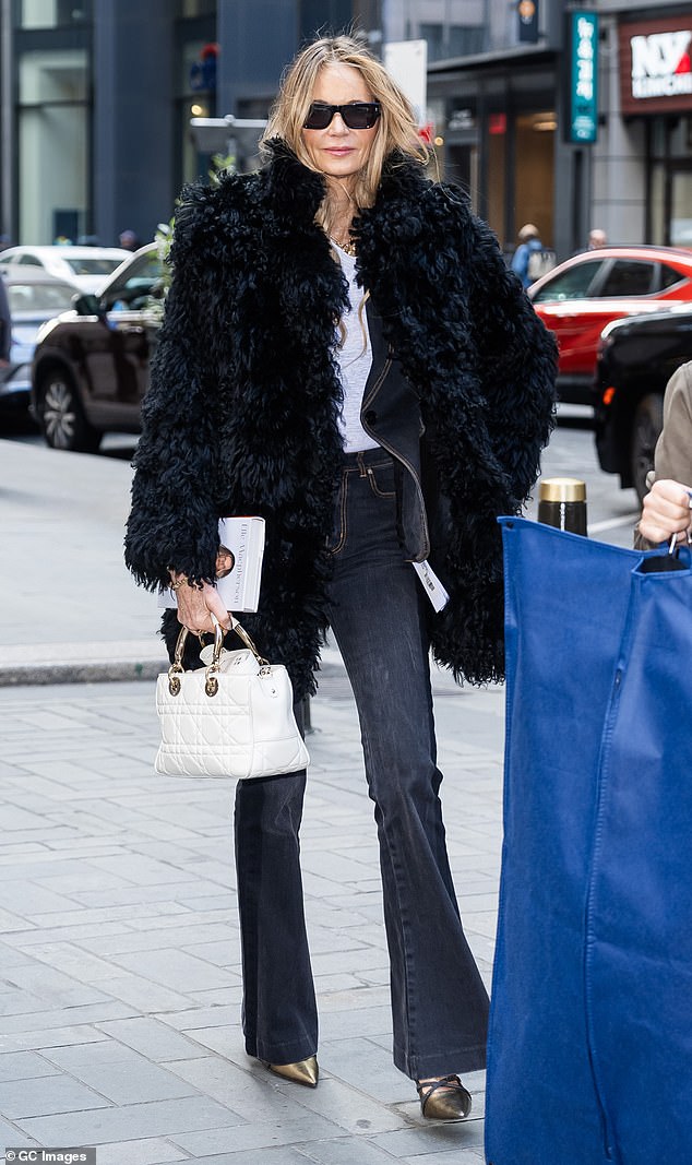 Elle Macpherson looked as youthful as ever as she stepped out in Midtown Manhattan, New York, on Tuesday after detailing the depths of her alcohol addiction