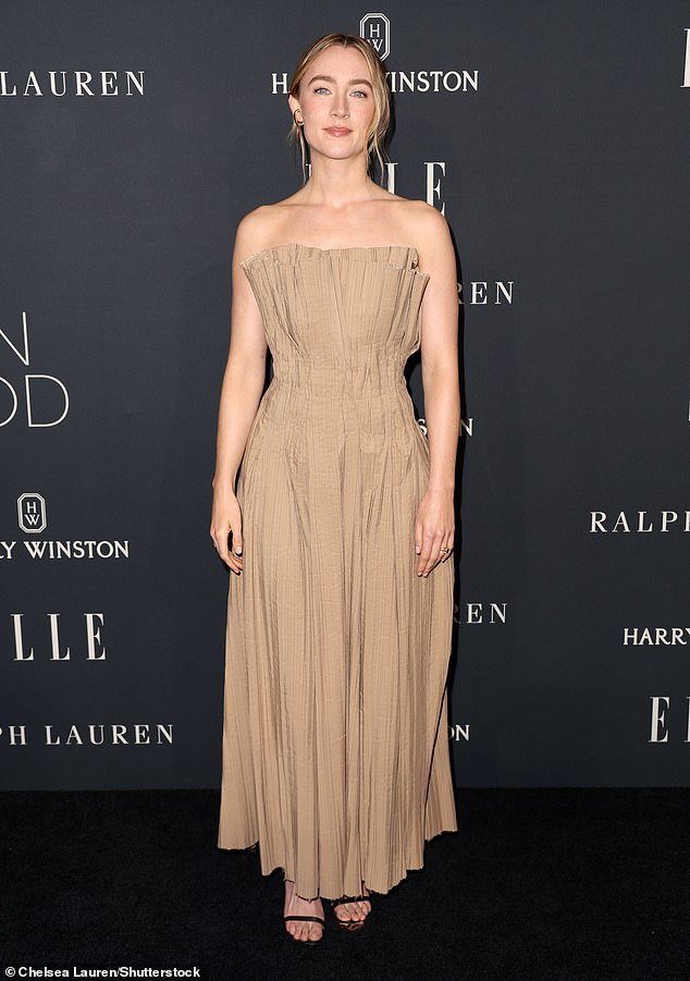 Saoirse Ronan stunned in a strapless tan gown as she joined the stars at the Elle Women In Hollywood event in Los Angeles on Tuesday night